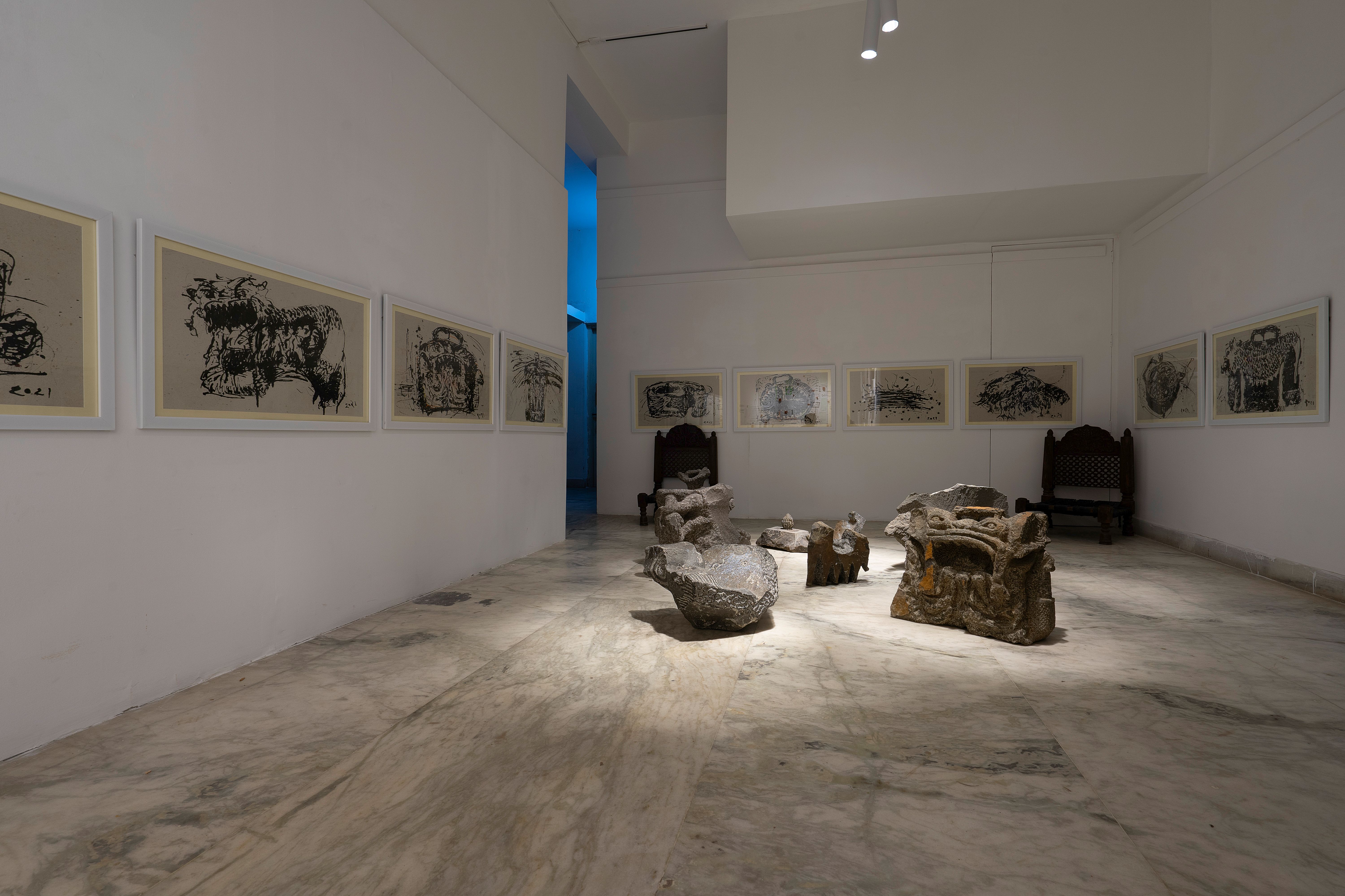 Artist-Arvind Shamrao Mangal; Title- Time and Planning; Medium- Black ink on Paper(painting) and Black Basalt Stone (Sculpture)